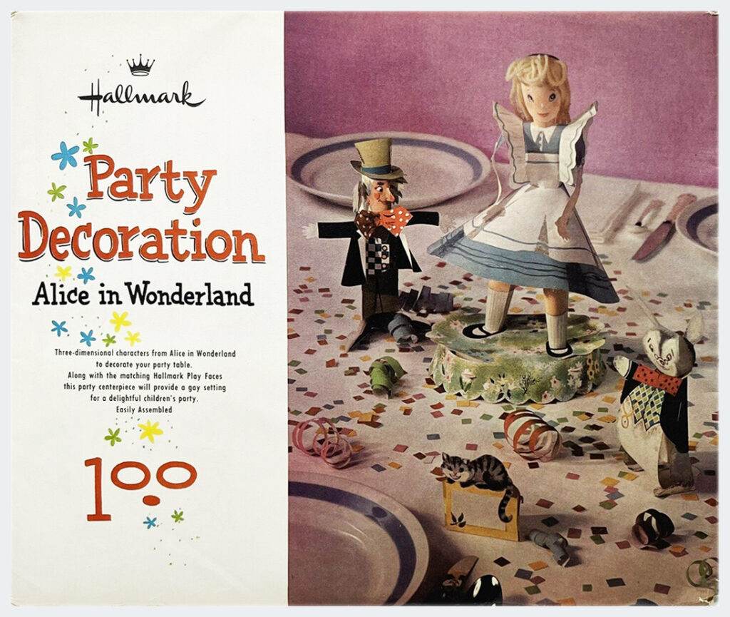 For vintage Hallmark ephemera collectors, The Halloween Retrospect archive is showing this envelope photo of the Alice in Wonderland three-dimensional party table decoration as part of an examination into package development for the holidays during the 1950's.