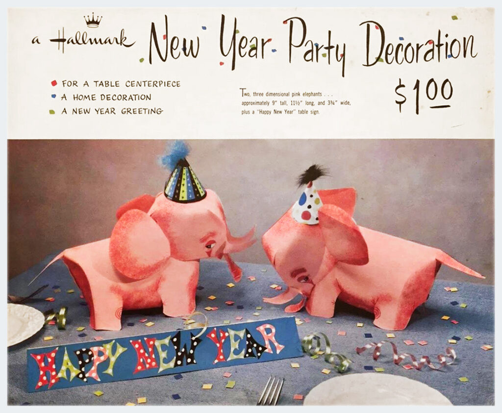 For vintage Hallmark ephemera collectors, The Halloween Retrospect archive is showing this envelope photo of the New Year Party Decoration (aka Pink Elephants) table centerpiece as part of an examination into package development for the holidays during the 1950's.
