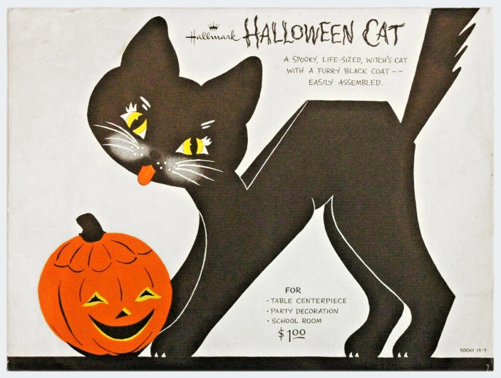The Hallmark spooky life-sized witch's cat with furry black coat to be assembled was made by Hallmark 1950's and shown in a photograph here to help vintage Halloween collectors with identification based on a new guidebook series by The Halloween Retrospect archive.