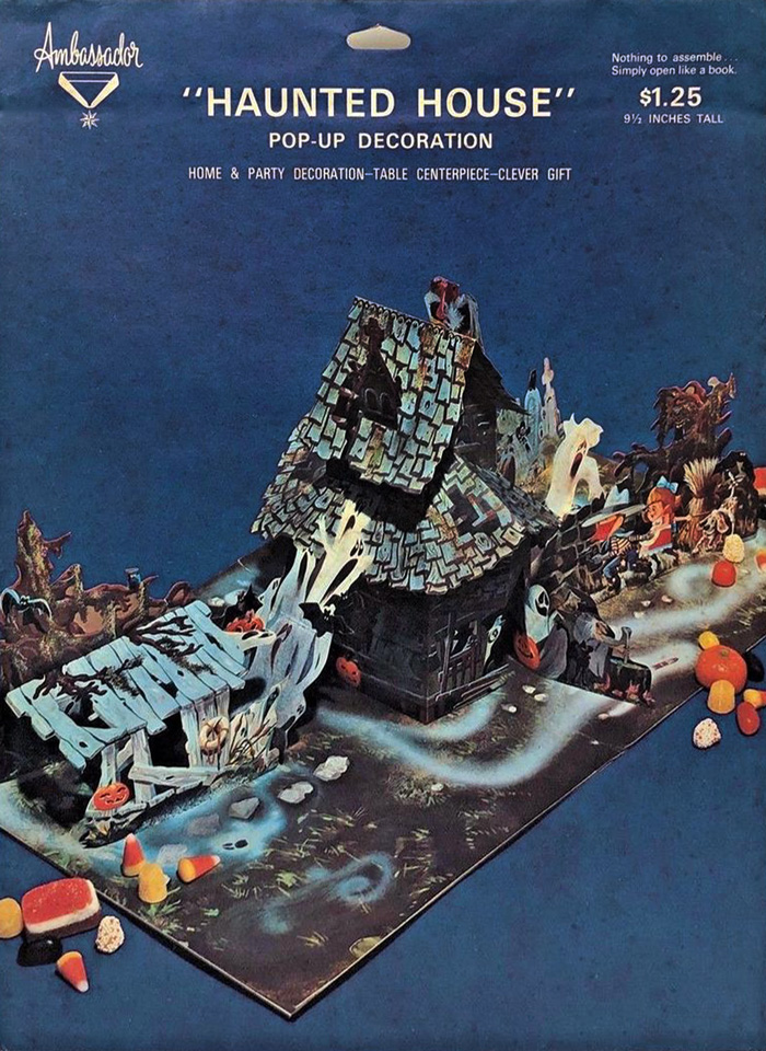 Ambassador (a line of Hallmark Cards) created this vintage Halloween pop-up centerpiece - a Haunted House in a swamp featuring ghosts, witches, jack o'lanterns, skeletons, and trick or treat kids. (Envelope identification guide by The Halloween Retrospect archive library).