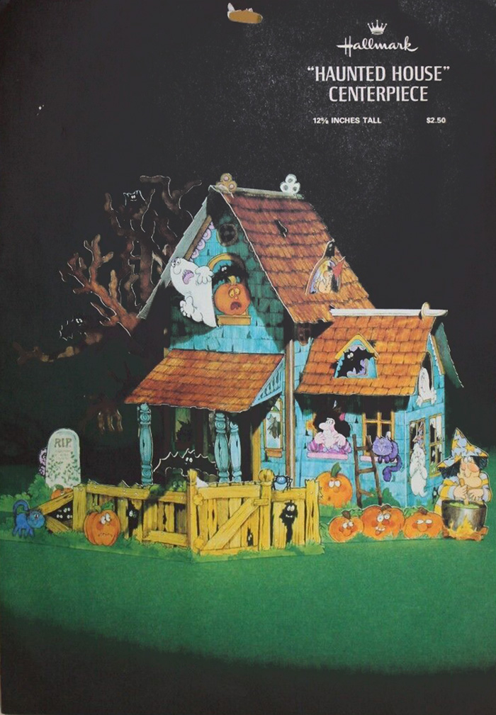 Haunted House Centerpiece envelope by Hallmark from the 1970's is shown here for a timeline that researches a timeline for vintage collectible based on package design for The Halloween Retrospect, Volume 3 guidebook series.