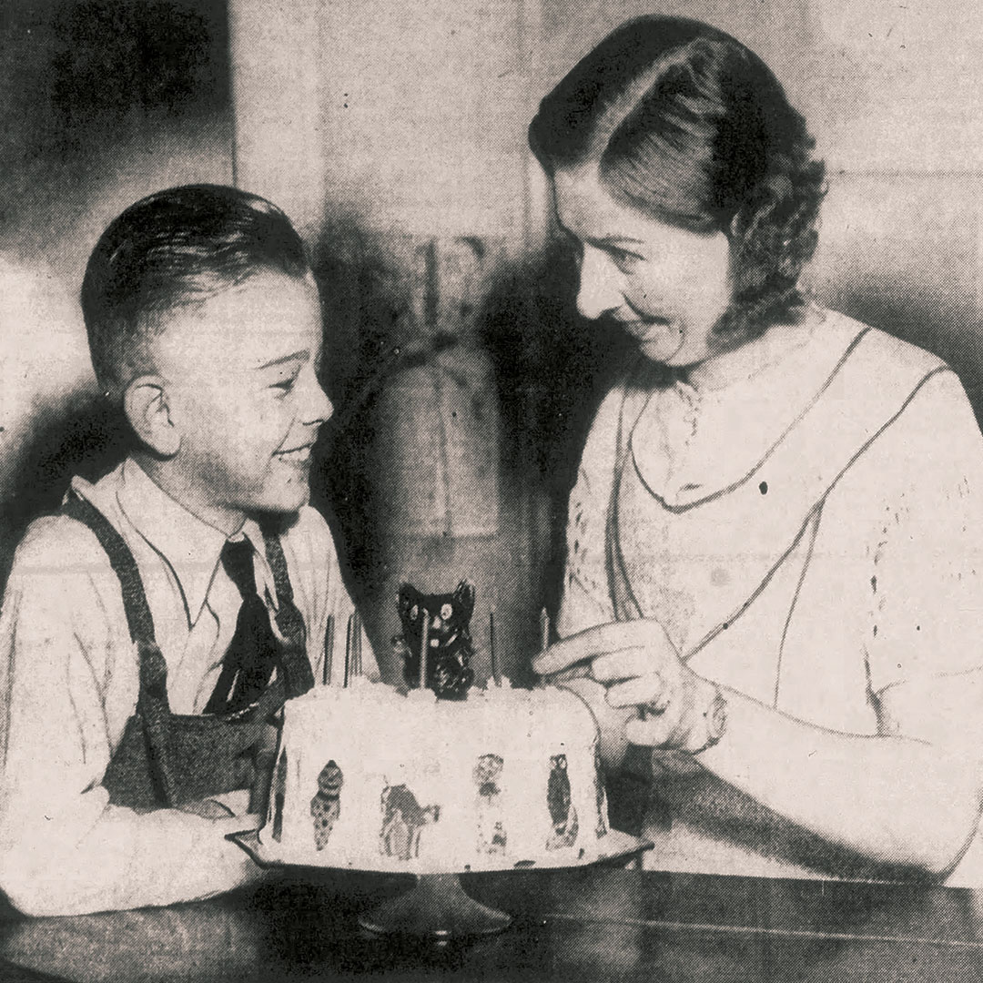 A black-and-white vintage Halloween birthday photo as seen from the Omaha Evening Bee News (1930) as pulled from newspapers.com for book research into digest Volume 2 that discusses the multiple uses of wood-base German embossed black cats and pumpkin people. (The Halloween Retrospect).